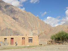 21 Motorcycle Outside Mudbrick House In Yilik Village On The Way To K2 China Trek